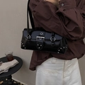 Glossy black baguette bag with silver rivets and metal buckle in a retro punk style - Black