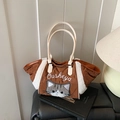 Brown quilted tote bag featuring cat embroidery and white plush fur trim detail - Brown
