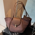 Dark brown suede bucket tote bag with slender straps and gold metal lock detail - Coffee