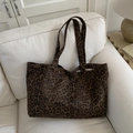 Large capacity leopard print tote bag with thick canvas texture on white fabric sofa - Large Leopard Print without Pendant