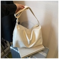 Minimalist beige hobo shoulder bag with adjustable strap and smooth faux leather texture - With Pendant / Off White