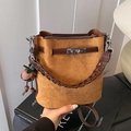 Brown frosted suede bucket bag with woven handle, metal lock, and strawberry charm detail - Suede Look With Charm / Brown