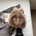 Borsa a mano color kaki in peluche con fibbie in metallo e manici in pelle chiara - Albicocca