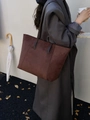 Classic dark brown suede tote bag with large capacity for women in a lifestyle autumn setting - Frosted