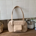 Minimalist beige suede bowling bag with smooth leather handles and front flap pocket - White