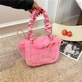 Pink faux fur handbag with a scrunchie leather handle and cute bow detail for winter - Pink