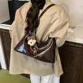 Dark brown retro underarm bag in glossy patent leather with silver chains and bear charm - With Charm / Brown