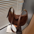Dark brown suede crescent bag with leather strap and golden hardware accents - Coffee
