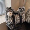 Tweed tote bag in black and white with leather straps and plush monster charm - Black