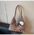 Detail of leopard print suede shoulder bag with brown strap and plush cloud pendant - Khaki
