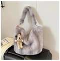 Detail of grey faux fur tote bag with soft plush texture and cute puppy charm accessory - Gray With Pendant