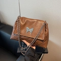 Borsa a spalla in pelle trapuntata testa di moro con fibbia a farfalla argento e catena - Marrone