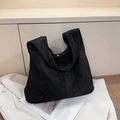 Borsa tote minimalista in finta pelle scamosciata nera con manico largo e morbido - Nero