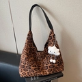 Large leopard print suede hobo bag with black leather strap and cute cloud charm - Black and Brown