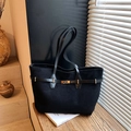Elegant black suede tote bag featuring a decorative leather strap and gold ring hardware - Black