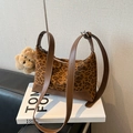 Leopard print crossbody bag with brown leather base and plush bear charm accent - Leopard Print