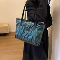 Quilted metallic dark green tote bag with adjustable shoulder strap and fashion label - Green