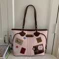 Rosa Vintage-Tragetasche mit braunen Ledergriffen und dekorativer Welpen-Stickerei - Rosa