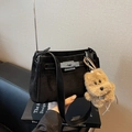 Black suede crossbody bag with silver twist lock and cute Top Dog plush puppy charm - With Charm / Black
