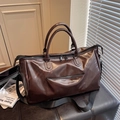 Dark brown leather travel duffel bag with double handles and adjustable shoulder strap - Coffee