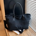 Black canvas tote bag with QZBG embossed lettering and leather handles - Black