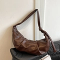Dark brown faux leather crossbody croissant bag with knot strap and matte finish - Brown No Pendant