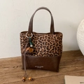 Retro bucket bag with leopard print stitching and dark brown leather with tassel - Leopard Print With Charm
