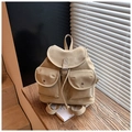 Detail of minimalist beige faux suede backpack with drawstring and twin front buckle pockets - Khaki