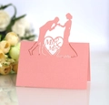 Pink pearlescent Mr & Mrs wedding place card with laser-cut romantic silhouette detail - Pink