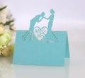 Detail of laser cut blue wedding place card with Mr & Mrs silhouette and heart design - Light Blue Zircon
