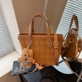 Brown suede tote bag with quilted texture, adjustable strap and plush dog charm - Yellow Brown With Pendant