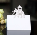 Detailed laser-cut white elephant table card with intricate floral patterns for weddings - White