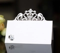 Elegant white laser-cut crown place cards for wedding tables with ornate European patterns - White