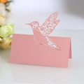 Pink laser-cut hummingbird place card with shimmering pearl finish for wedding table decor - Pink
