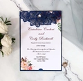 Detail of laser-cut navy blue floral wedding invitation with elegant printed insert card - Magic Blue