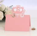 Pink laser cut wedding escort card with pumpkin carriage design and crown detail - Pink