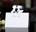 Dettaglio del segnaposto bianco intagliato a laser con sagoma su carta perlata - Bianco