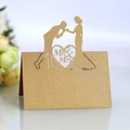 Gold glitter Mr & Mrs wedding place card featuring laser-cut heart and couple silhouette - Beige Gold