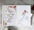 Detailed macro view of laser-cut lace invitation with pink floral inner card and RSVP - White