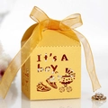 Κίτρινο κουτί δώρου laser-cut με κείμενο It's A Boy και διακοσμητική κορδέλα - Χρυσό