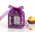 Detail of laser-cut hollow pattern on purple candy box with satin ribbon bow - Dark Purple