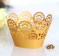 Elegant gold laser-cut lace cupcake wrappers with delicate floral vine patterns - Gold