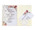 Detail of laser-cut ivory wedding invitation set with floral insert and RSVP card - Starry White