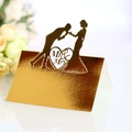 Golden Mr & Mrs silhouette wedding table card with elegant heart-shaped cutout design - Reflective Gold