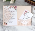 Champagne laser-cut wedding invitation set with floral card and RSVP on marble background - Nude Pink