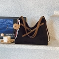 Large black suede shoulder bag with brown leather strap and cute bear charm pendant - Black with Pendant