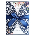 Elegant navy blue laser-cut wedding invitation with a satin bow and floral inner card - Magic Blue