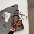 Fashionable leopard print bucket bag with brown leather accents and gold hardware detail - Brown No Pendant