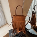 Vintage brown suede bucket bag with tiered fringes, dual handles and crossbody strap - Brown