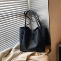 Large black leather tote bag with dual slim straps and snap buckle for commute - Black